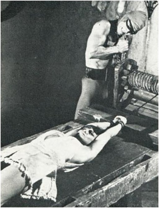 buxom actress stretched on a torture rack
