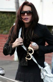 lindsay lohan and her handcuffs