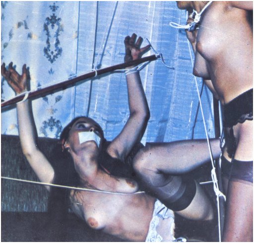 clothesline bondage and a broomstick spreader bar