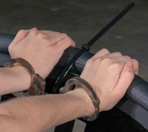handcuffs and a zip tie