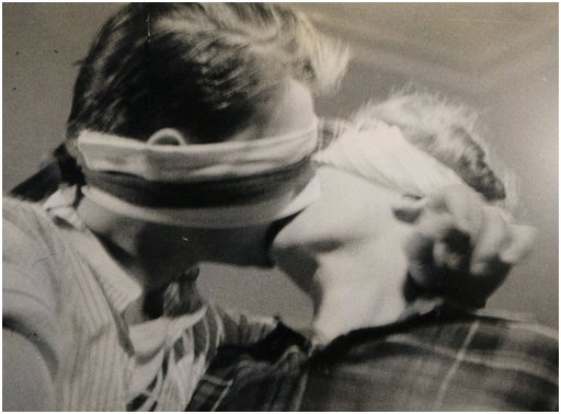 vintage photo of blindfolded kissing party games
