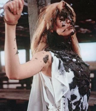 Catherine Deneuve tied up and splattered with horse shit