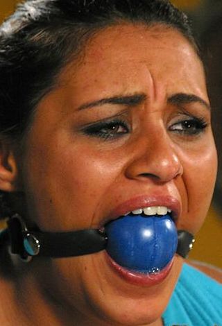 ball gag in the mouth of charley chase