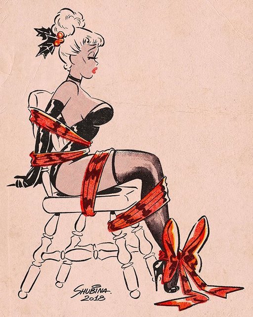 pretty pinup beauty queen tied up with christmas ribbons and bows