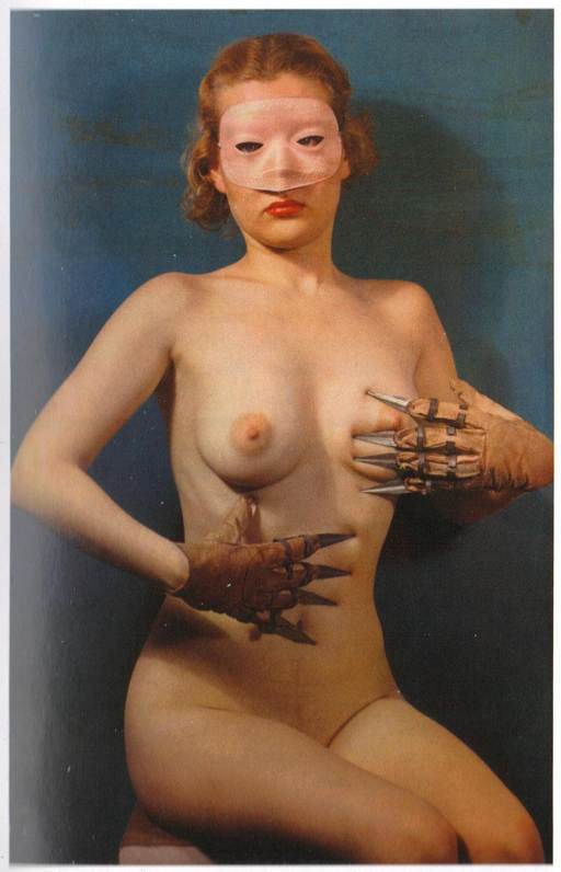 woman with claw gloves