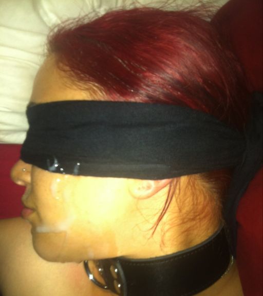 semen on face of blindfolded and collared pet girl