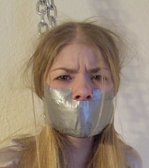 pissed off in her tape gag