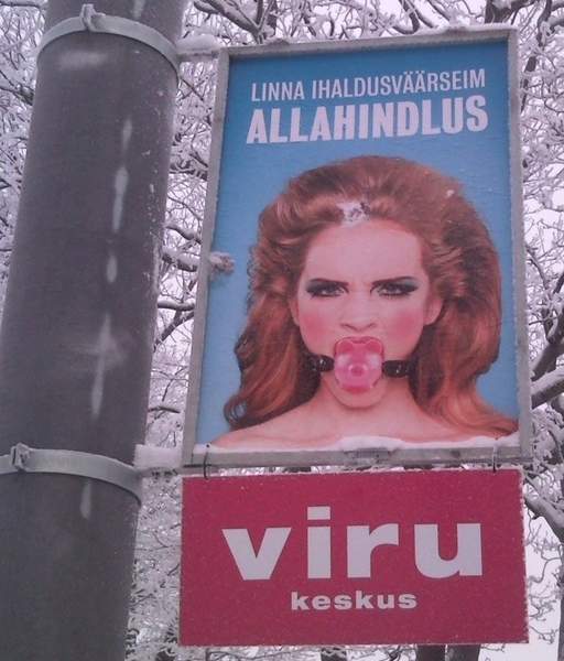 billboard bondage in estonia -- gagged woman