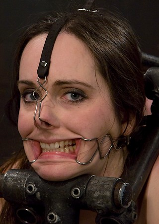 face tied in bondage with nose hook