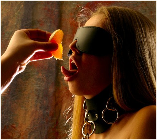 collared and blindfolded slavegirl eats fruit from her masters hand