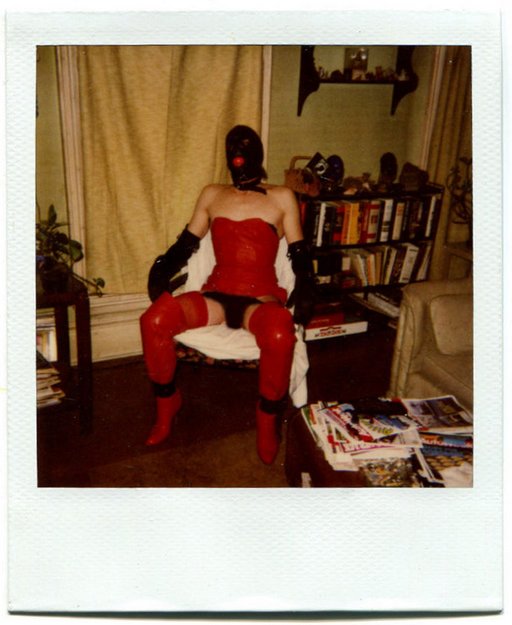 gagged and hooded polaroid bondage