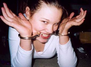 pretty girl handcuffed