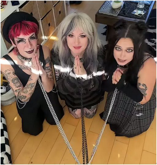 three hot goth women kneeling and begging