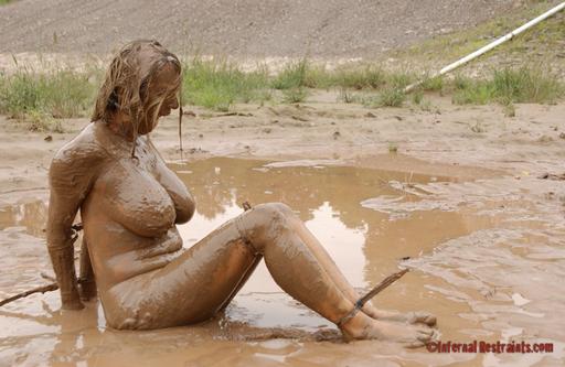 Trina in bondage and covered in humiliating mud