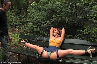 helplessly bound on a public park bench