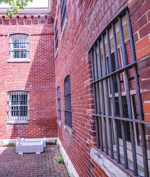 barred windows on prison house