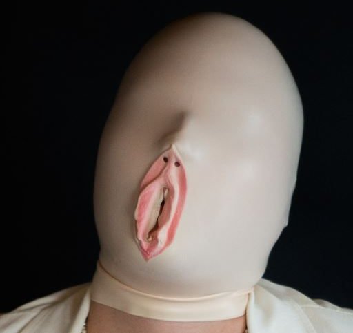 latex hood with a cuntface mouth hole