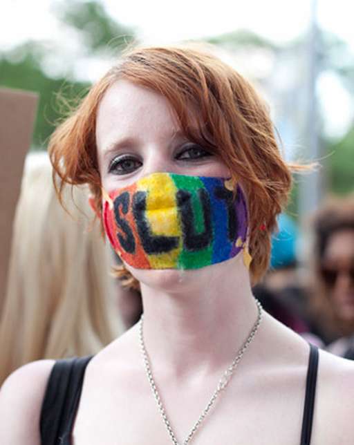 rainbow tape gag for a slutwalk protester/demonstrator
