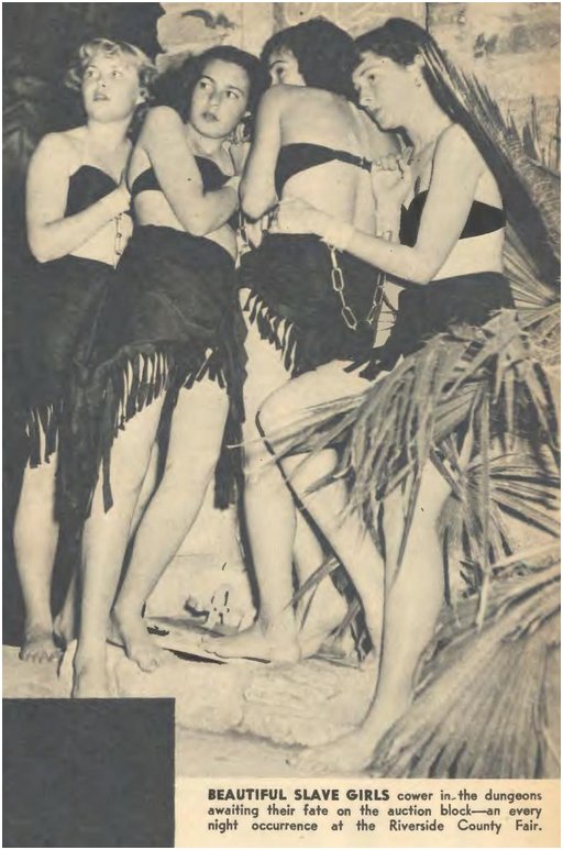 cowering slavegirls before the nightly slave auction at the Riverside county fair