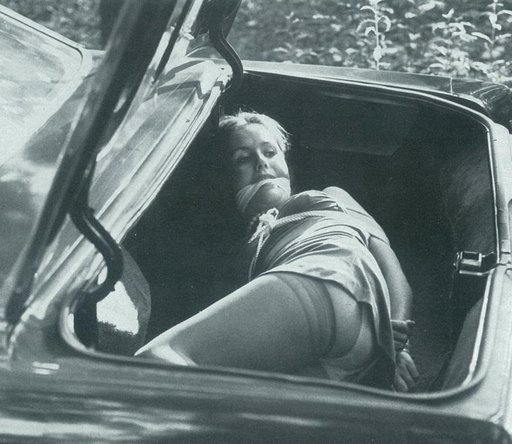 Sally Roberts gagged in the trunk of a car