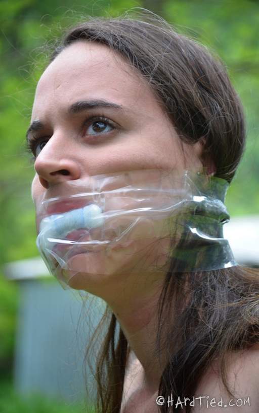 taped cloth in mouth gag