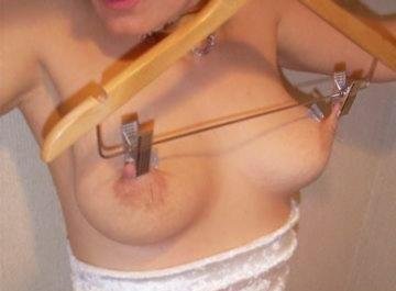 drying her titties with a hangar and clips
