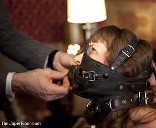 muzzled slave girl at The Upper Floor