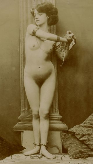 vintage slavegirl in shackles