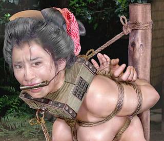 japanese bondage featuring heavy wooden collar